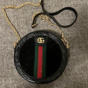 Gucci round gold chain bag